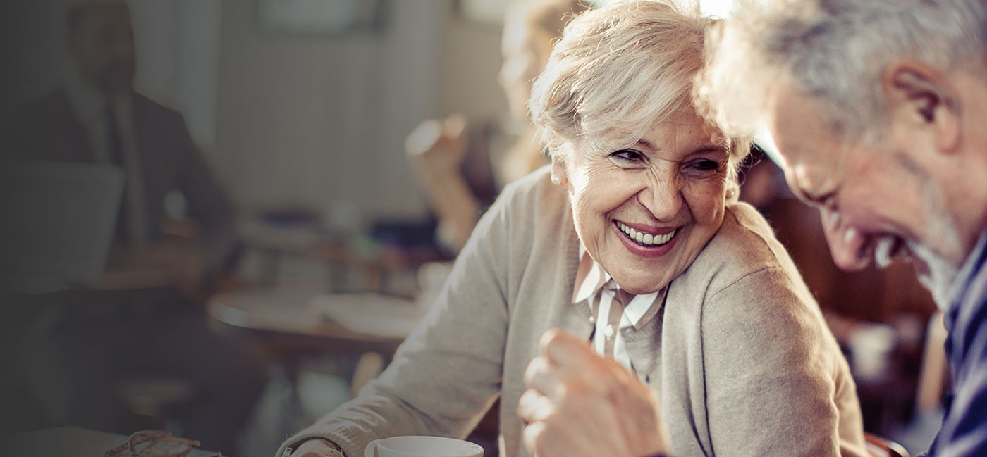 senior woman smiling at her spouse